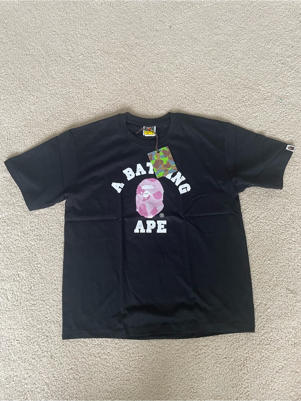 A Bathing Ape Black Tee with Pink Camo Ape Logo